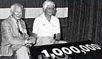 Zora with retired Corvette Chief Engineer, Dave McLellan atop the 1,000,000th Corvette.