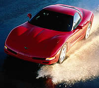 A Corvette running through water